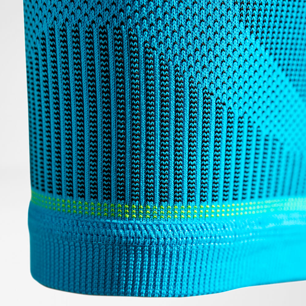 Waden Maniche dettagliate zone di compressione Vista dettagliata degli Unterschenkelsleeves con un focus sul percorso a maglia all'estremità inferiore