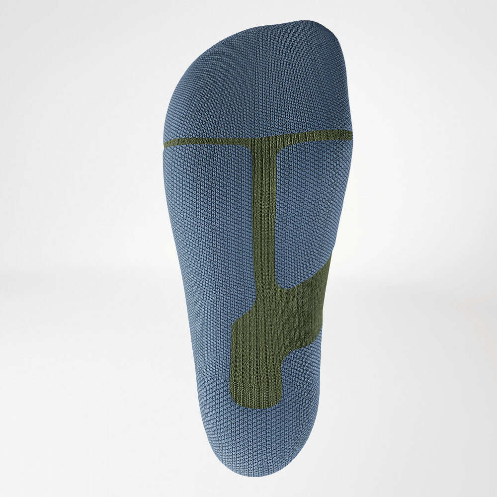 Groene Ski-Compressiesok – Ergonomische Zool voor Stabiliteit en Demping.