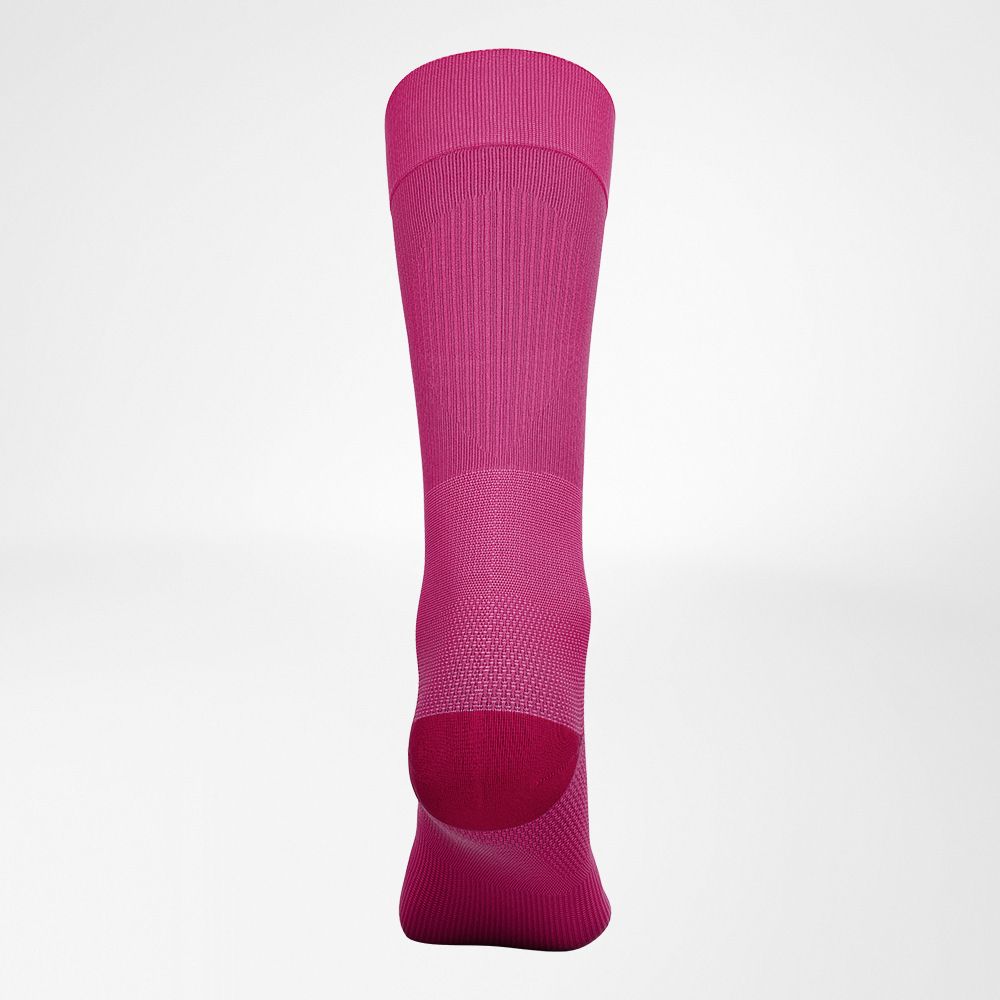 Vista posteriore completa della calza da sci sottile rosa
