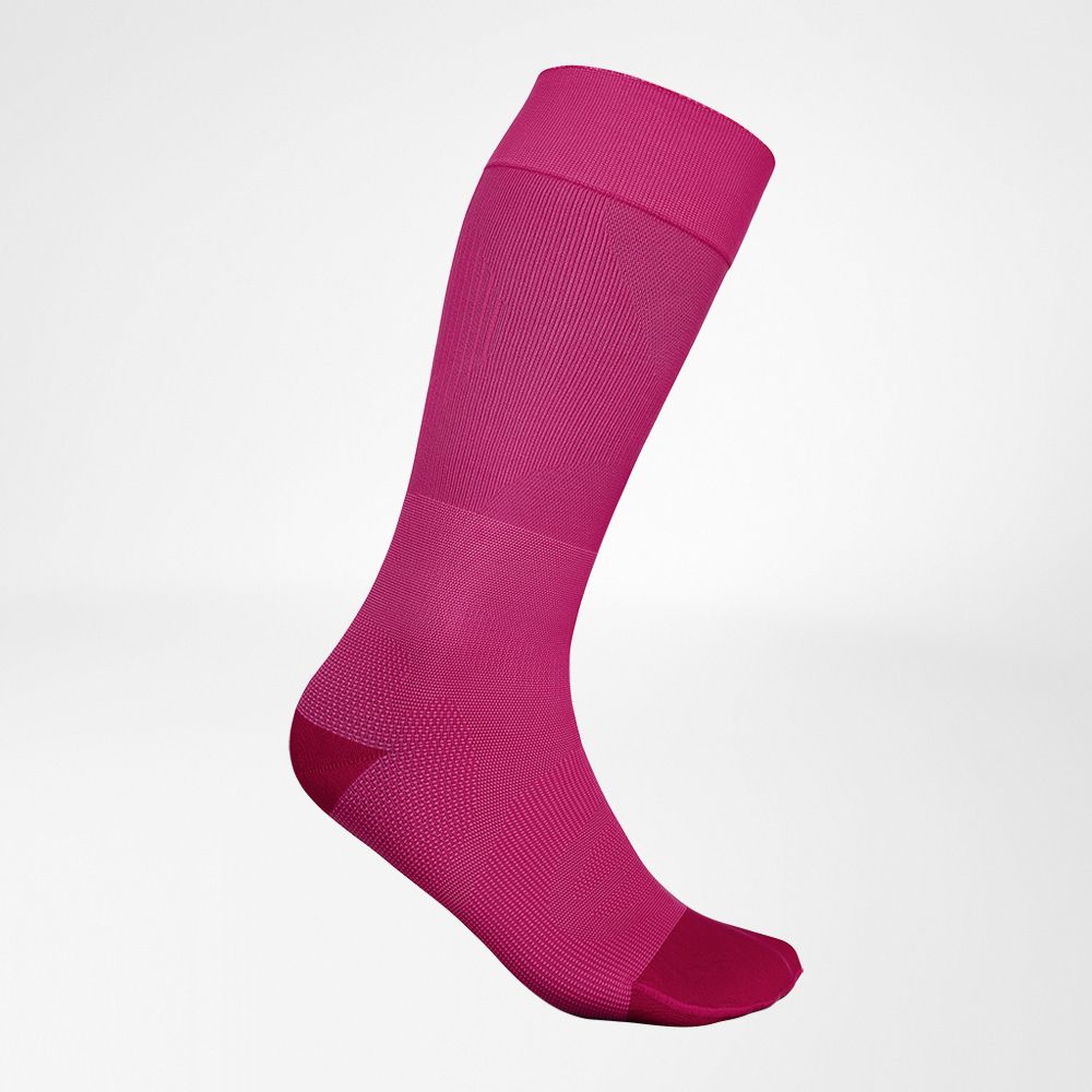 Vista laterale della calza da sci sottile rosa
